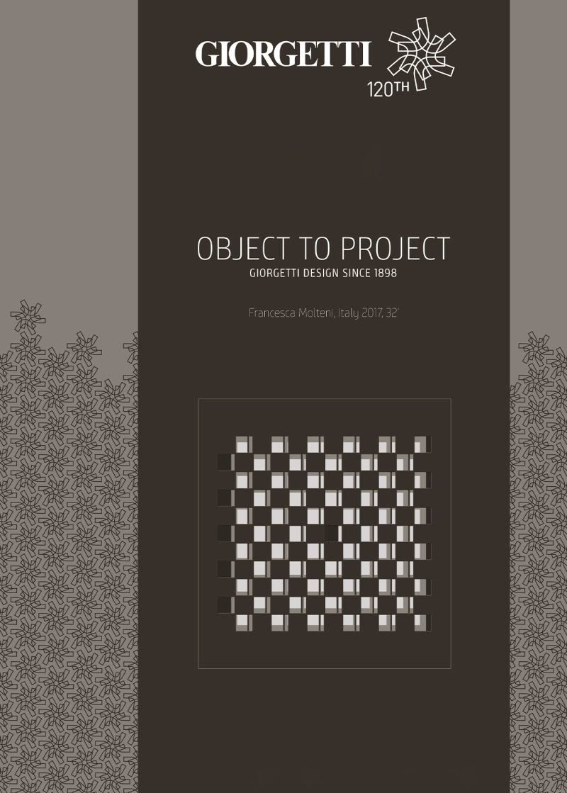 Locandina del documentario Object to Project. Giorgetti Design Since 1898 — composizione grafica su sfondo bruno scuro con griglia di elementi modulari in legno e motivo decorativo ramificato ai lati